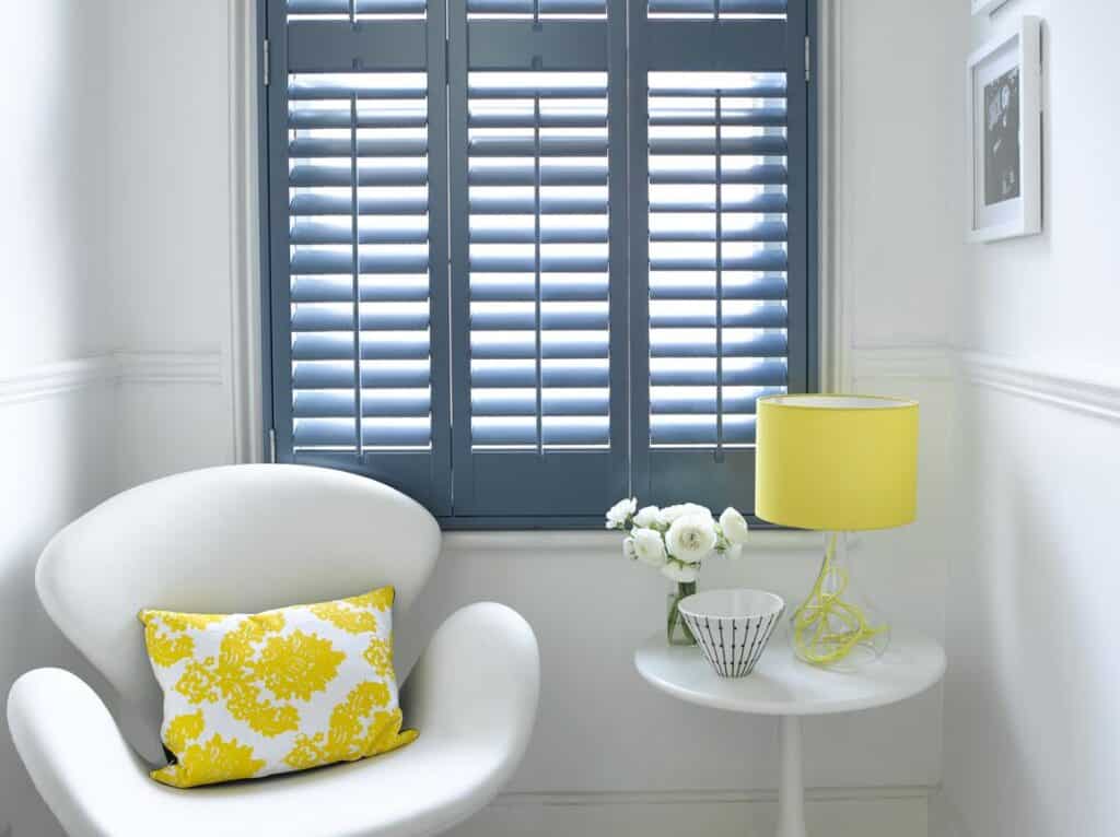 Soft blue 3 panel full height shutters close up