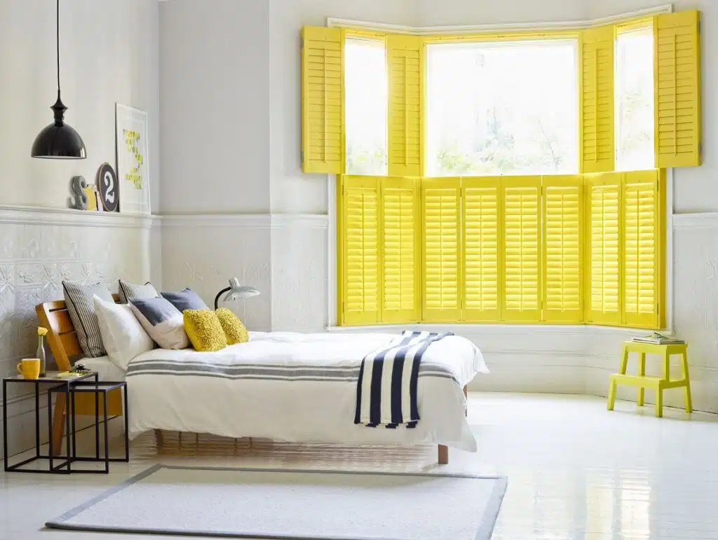 Yellow bedroom bay window shutter hybrawood top open